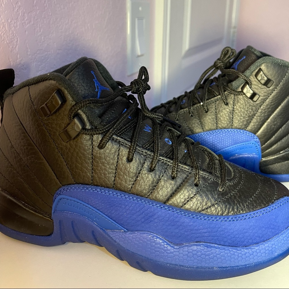Jordan 12 GAME ROYAL 5.5 GS EQUIVALENT TO A 7 in women lightly worn w/ box